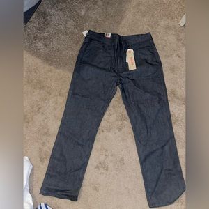 Levi’s, dark blue denim